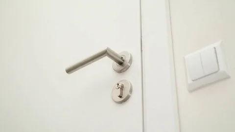 A Man's Hand Opening a Door Stock Footage 82645522