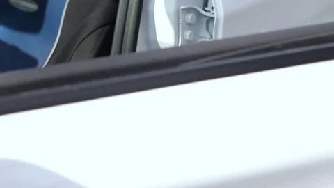 The man's hand opens the car door. Stock Footage 74373545