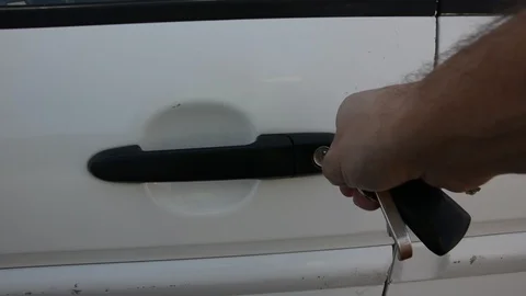 Man's hand opens the car door with a key. transportation concept 스톡 동영상 93856433