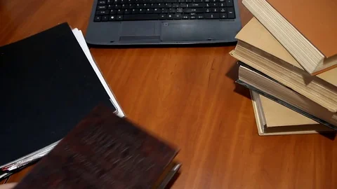 A man's hand opens a mini safe and lays coins, the top view Stock Footage 84225446