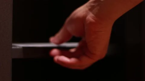 Man's hand opens the safe and takes out the documents Stock Footage 139496460