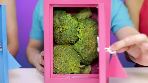 A man's hand opens a safe with broccoli Stock Footage 161425340