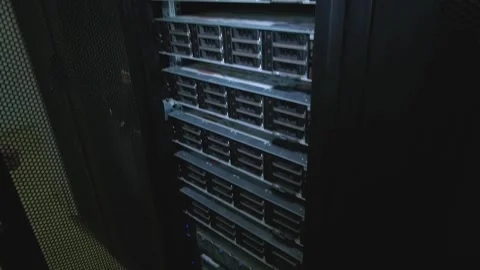 A man's hand opens the server cabinet door. The server is visible. Stock Footage 295018453