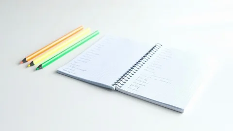 Man's hand planning in a notebook Stock Footage 128714647