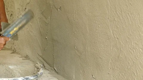 Man's hand plastering a wall . Stock Footage 71110402