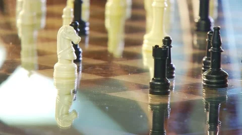 Man's hand playing chess Stock Footage 61084708