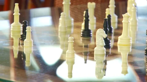 Man's hand playing chess Stock Footage 61084784