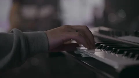 Man's hand playing a Piano 스톡 동영상 202307669