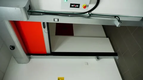 A mans hand presses the button that triggers the opening of an electric gate. Video stock 315311384