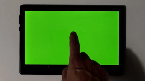 Man's hand presses with a finger touch on the screen of a tablet. Stock Footage 245431652