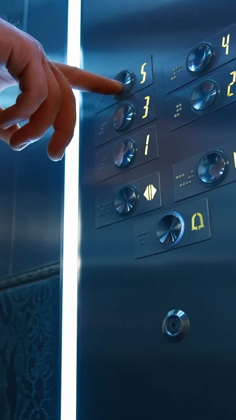 Man`s hand presses floor buttons in elevator. Stock Footage 302817226