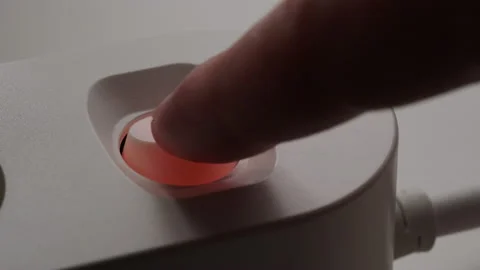 The man's hand presses the switch button Stock Footage 131205372