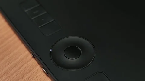 Man's hand pressing button on graphics tablet Stock-Footage 85402467