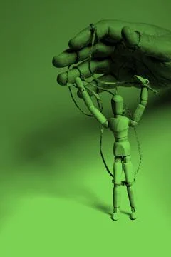 Man's hand pulling strings of wooden puppet. Concept of emotional manipulatio 스톡 사진
