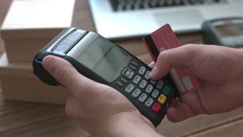 Man's hand pushing the button and swipe credit cardterminal Stock Footage 73020863