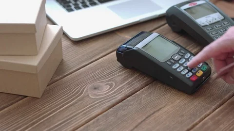 Man's hand pushing the button and swipe credit cardterminal Stock Footage 73021060