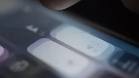 Man's hand put mute silent on the iphone screen. mute phone concept. 스톡 동영상 233084295