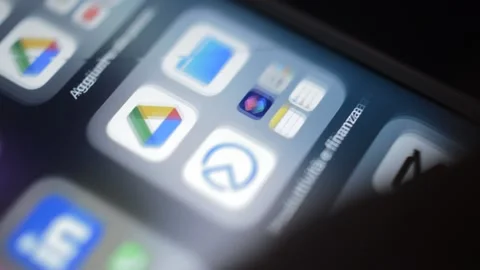 Man's hand put mute silent on the iphone screen. mute phone concept. Stock Footage 233084499