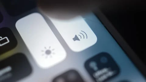 Man's hand put mute silent on the iphone screen. mute phone concept. Stock Footage 233084545