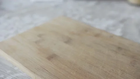 Man's hand puts pepper on the cutting board 動画素材 131985130