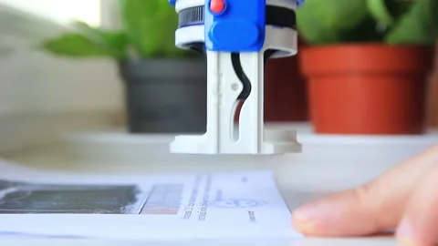 Man's hand puts a stamp under the text, assuring him Stock Footage 220871349