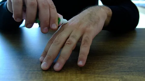 A man’s hand putting on and taking off a ring Stockbeeldmateriaal 292035354