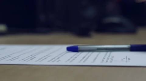 Man's hand putting down a pencil on the top of the assigned contract. Stock Footage 43088256