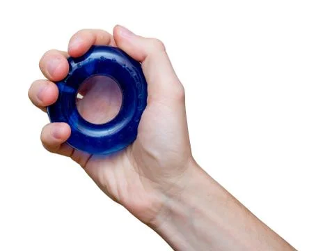 Man's hand with rubber ring (hand gripper). Sport and equipment. Isolated. Stock Photos