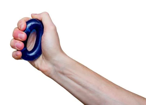 Man's hand with rubber ring (hand gripper). Sport and equipment. Isolated. Stock Photos