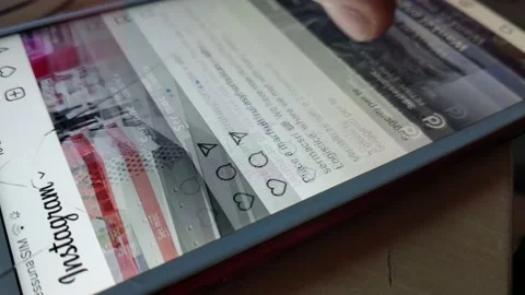 Man's hand scroll social media on the iphone screen. instagram social scrolling. Video stock 232989004