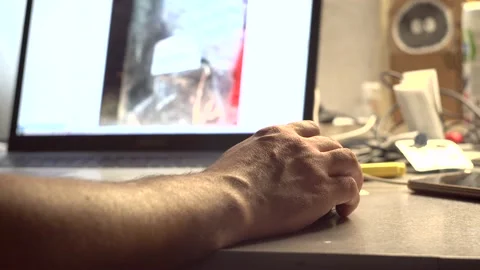 Man's hand scrolling through the content on the screen 4K Stock Footage 201611839