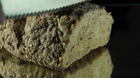 Man's Hand Is Slicing Homemade Bread Stock Footage 55369548