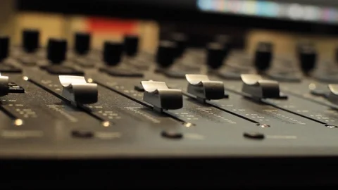 Man's hand at Sound Control Panel Stock Footage 125033570