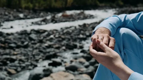 A man's hand squeezes a woman's hand close-up Stock Footage 252527732