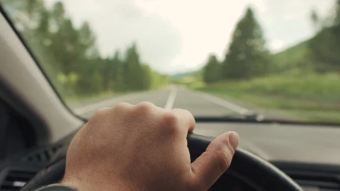Man's hand on the steering wheel Stock Footage 92355036