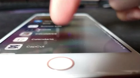 Man's hand swipe iphone screen display. iphone by apple screen. Stock-Footage 238781844