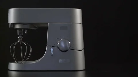 Man's hand switch on a kitchen stand mixer Stock Footage 76642634