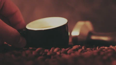 Man's hand takes a cup of espresso Stock Footage 156043333