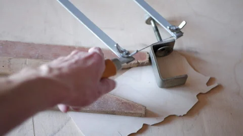Man's hand takes a jigsaw Video stock 151962985