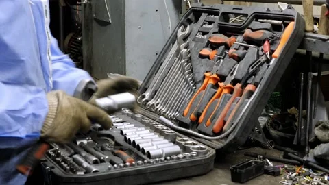 A Man's Hand Takes Tools From A Box With Bits, Keys, Screwdrivers Stock Footage 198145644