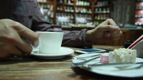 Man's hand taking a cup of coffee Stock Footage 50374744