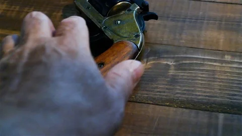 Hand Gun On Table Stock Footage ~ Royalty Free Stock Videos | Pond5