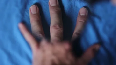 Man's hand through the magnifying lens Stock Footage 66753577