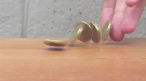 The man's hand throwing a coin on the table, Euros Stock Footage 52636189