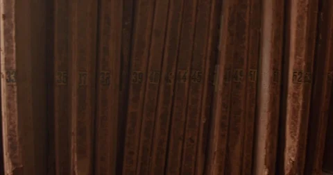 Mans hand tooks one folder in shelf Stock Footage 76091922