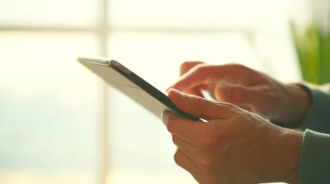 Man's hand touching tablet computer surface touchscreen Stock Footage 67358610
