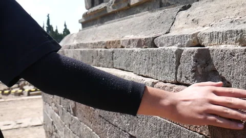 A man's hand touching the temple building Stock-Footage 291372138
