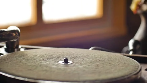 Mans hand turning the handle of the old retro gramophone close-up slow motion Stock Footage 70763760