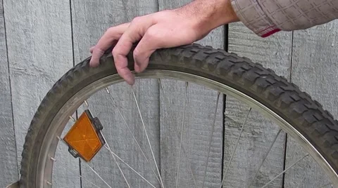 The man's hand turning the wheel Stock Footage 57324173