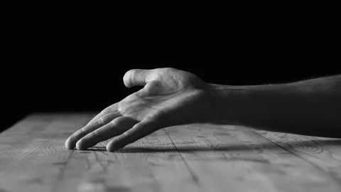 Man's hand turns, palm down Stock Footage 237724432